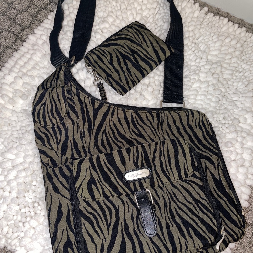 Baggalini black/camouflage green color zebra print multi pockets crossbody bag